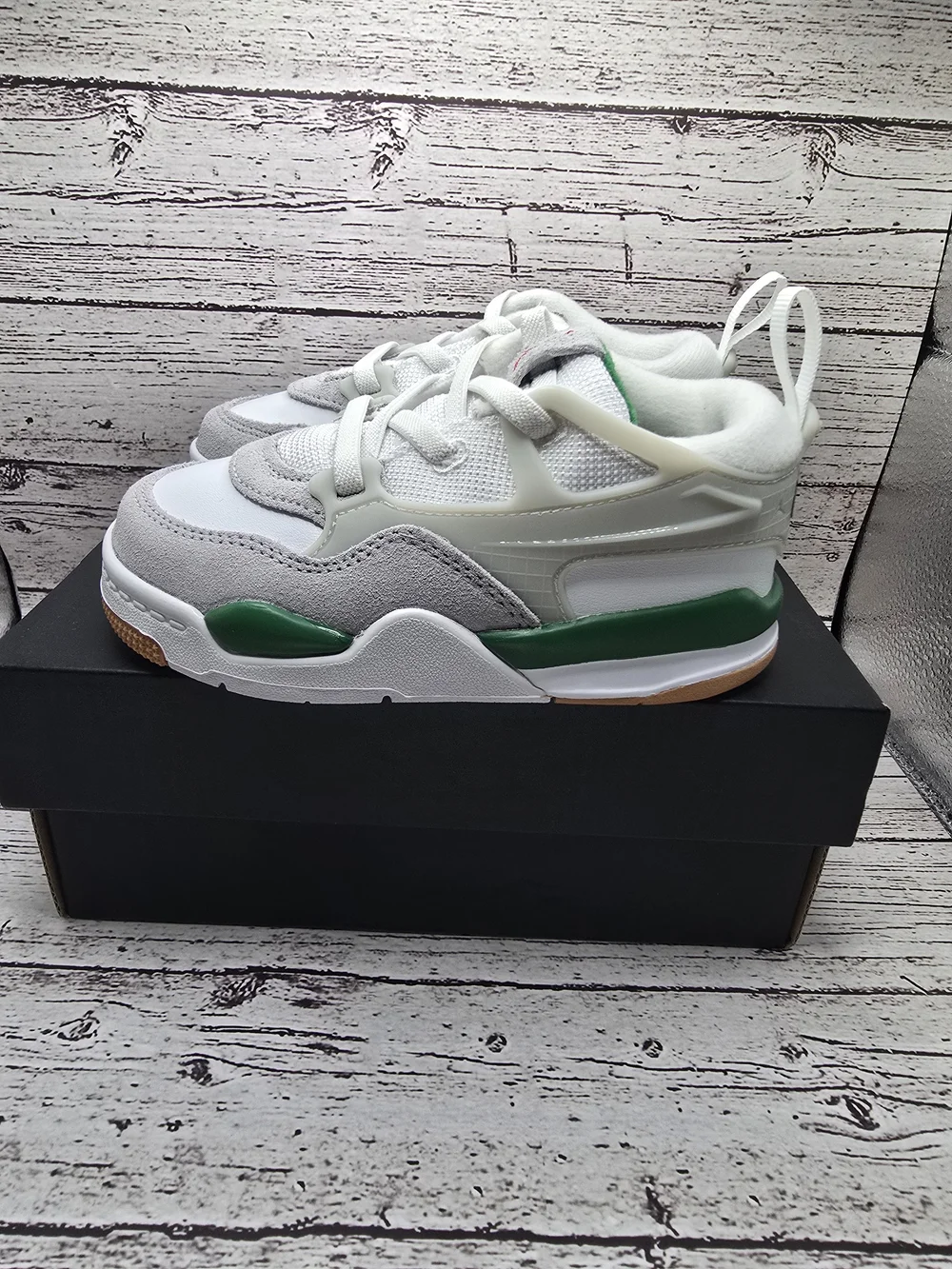 Jordan 4 RM Kids' White and Gray Athletic Sneakers with Green Accents